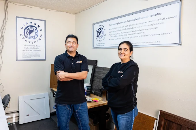 The owners of Level 10 Overhead Door in their San Jose office